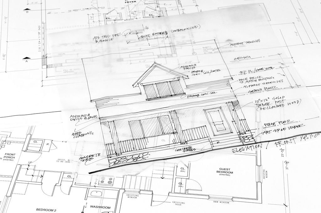 house renovation blueprints and facade sketch